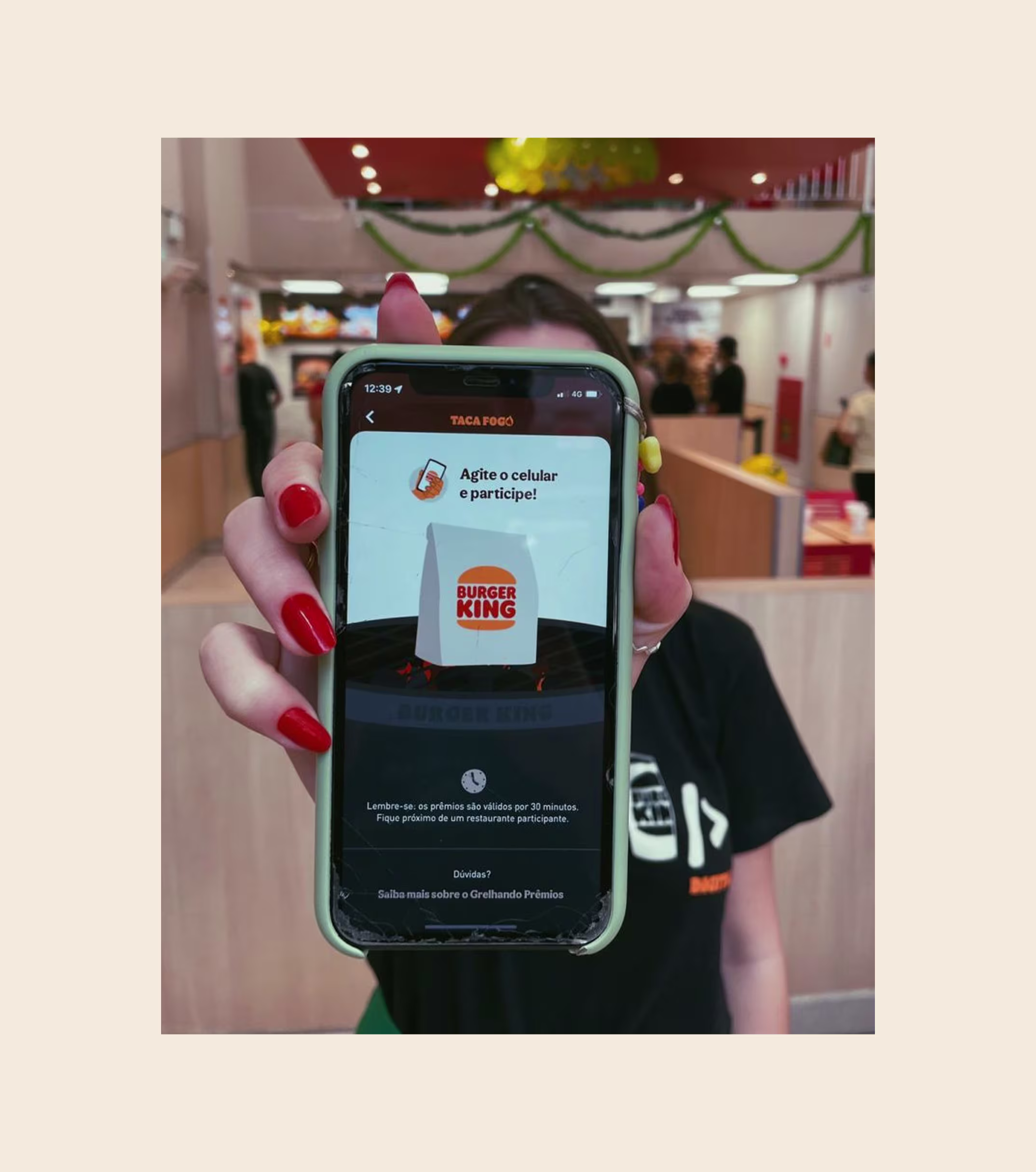 The shake screen on a phone in a restaurant